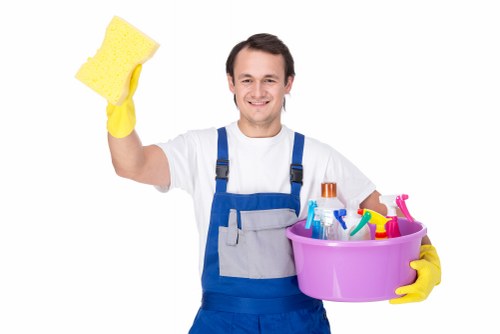 Person submitting a formal complaint document in an organized setting